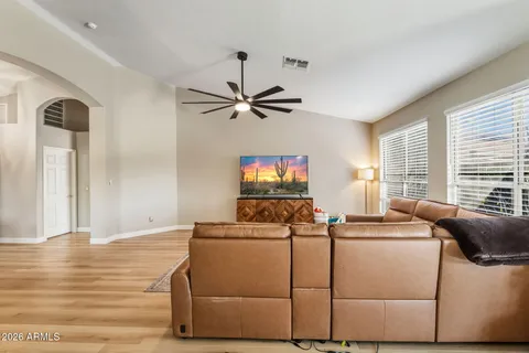 a living room with furniture and a window