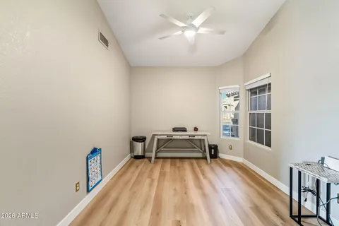 a bed room with a bed and a window