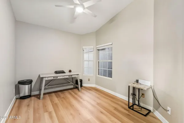 a room with a bed and a window