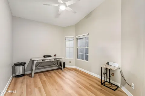 a room with a bed and a window