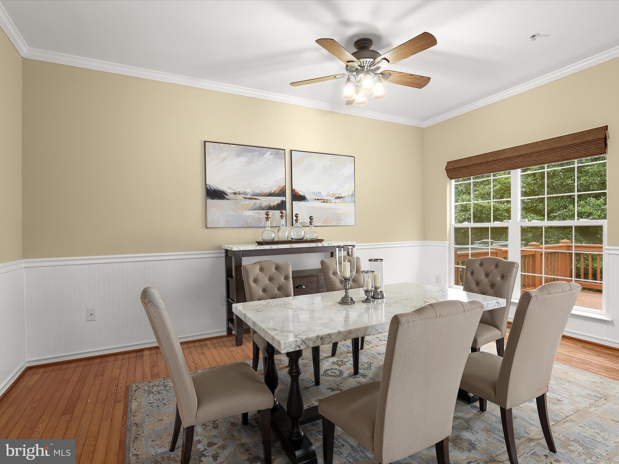 2614 Streamview Drive Odenton, MD 21113 - Photo 12 of 52 a view of a dining room with furniture and a table