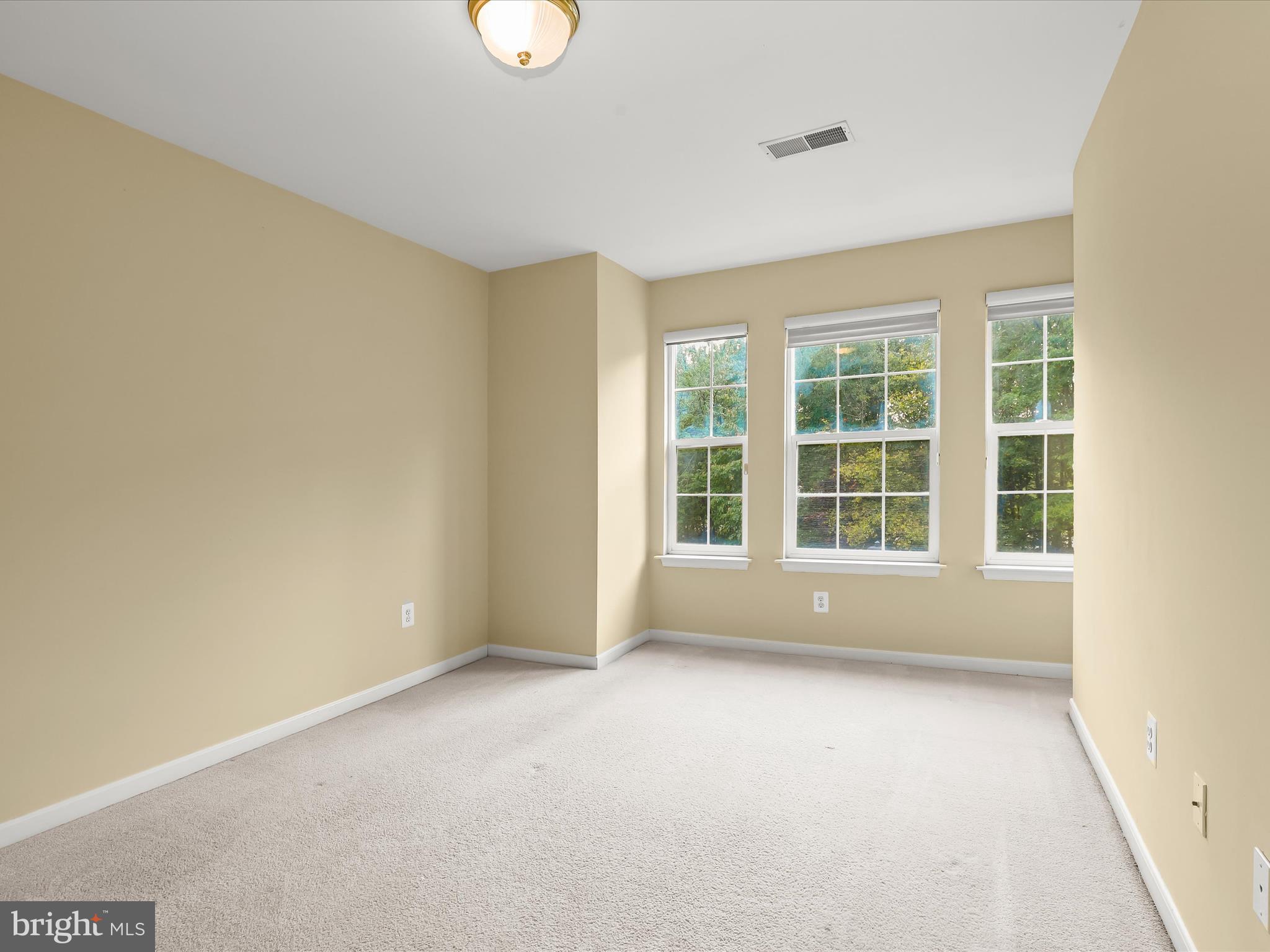 2614 Streamview Drive Odenton, MD 21113 - Photo 23 of 52 an empty room with windows