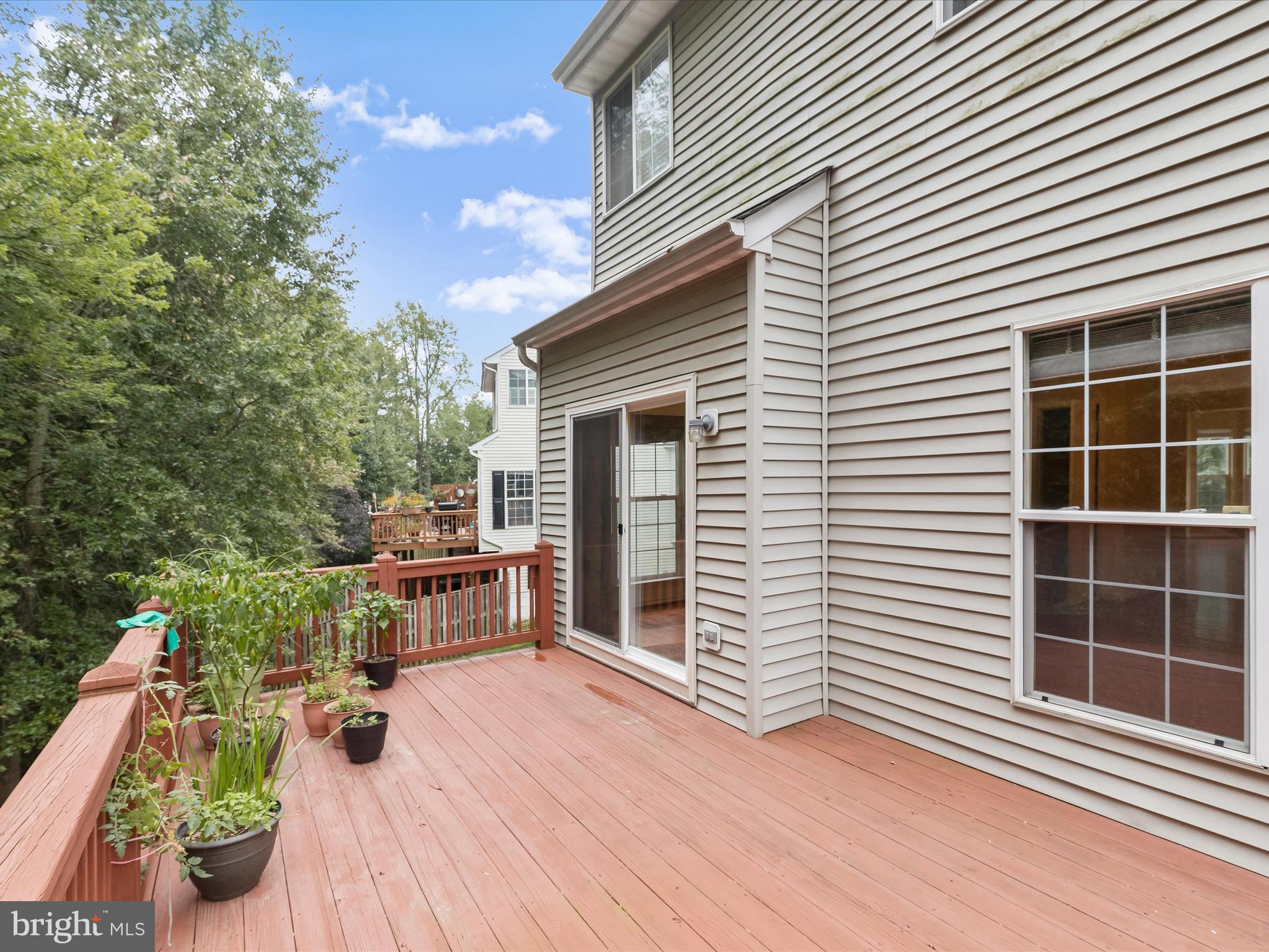 2614 Streamview Drive Odenton, MD 21113 - Photo 32 of 52 a view of a house with backyard and sitting area