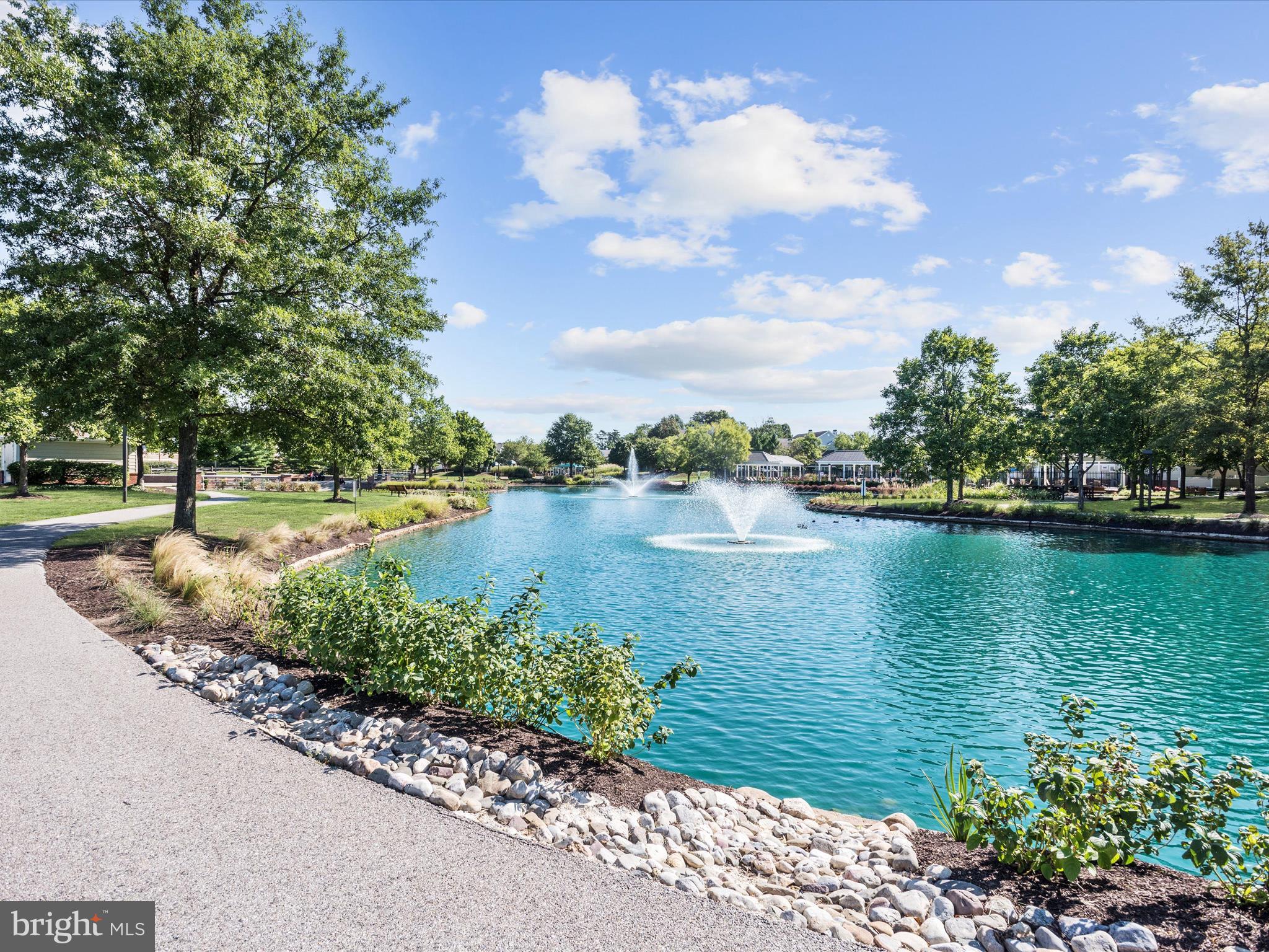 2614 Streamview Drive Odenton, MD 21113 - Photo 36 of 52 a view of a lake with houses in the back