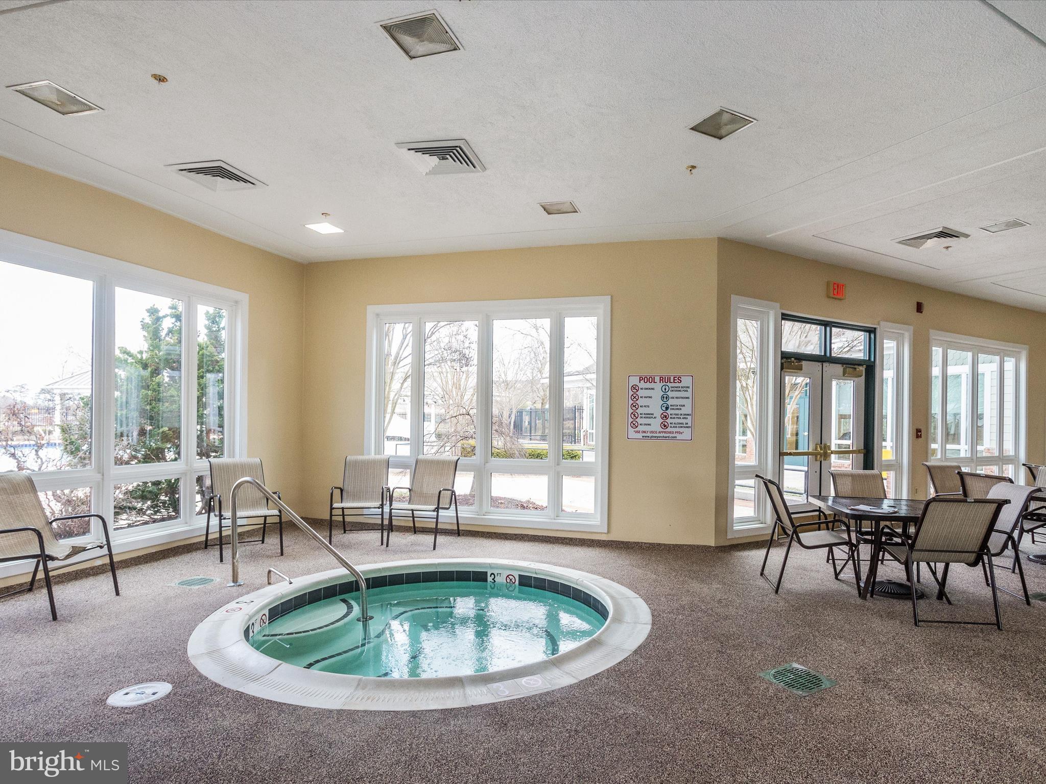 2614 Streamview Drive Odenton, MD 21113 - Photo 45 of 52 a living room with furniture a table and a large window