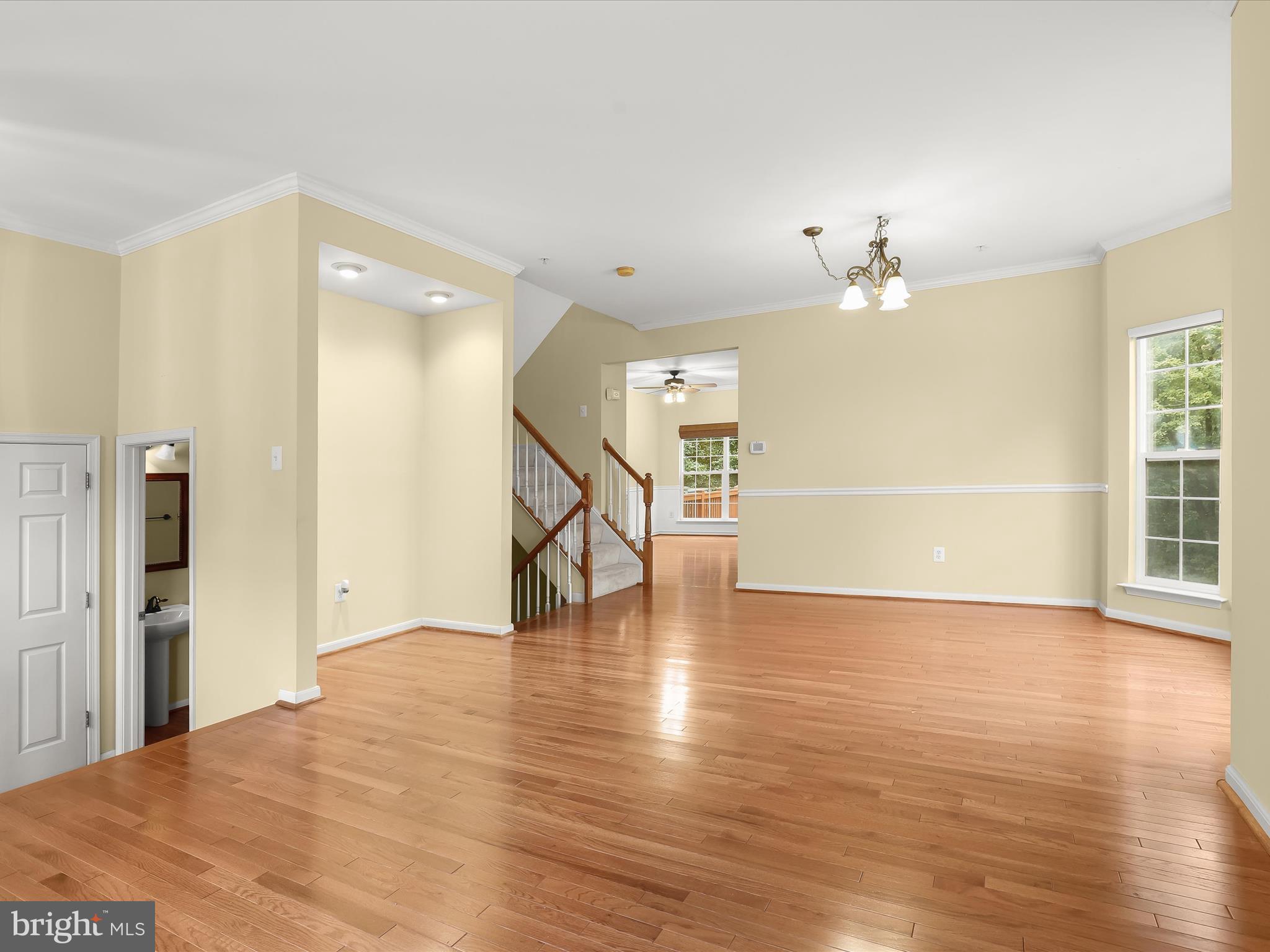 2614 Streamview Drive Odenton, MD 21113 - Photo 6 of 52 a view of an empty room with wooden floor and a window