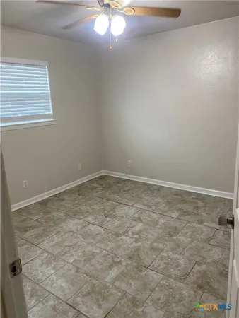 a kitchen with stainless steel appliances a stove a sink and a refrigerator