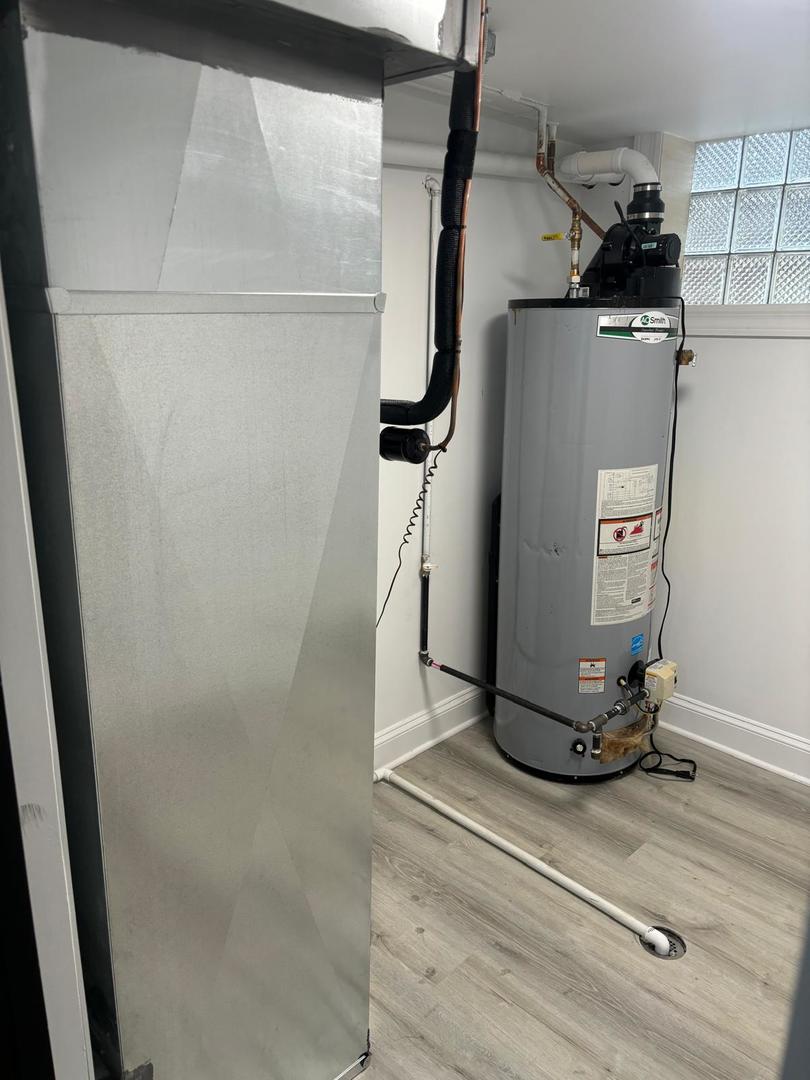 14609 Justine Street Harvey, IL 60426 - Photo 30 of 33 a view of a faucet