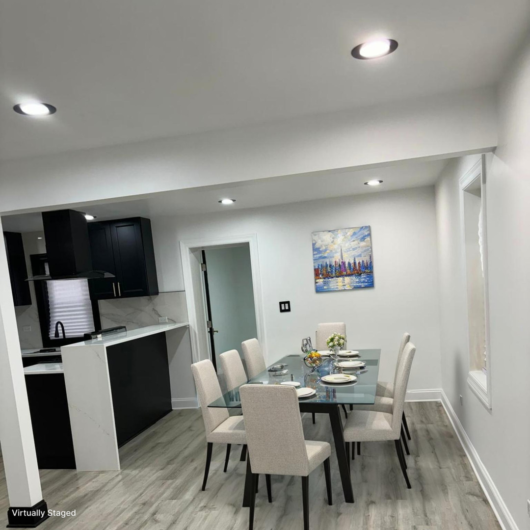 14609 Justine Street Harvey, IL 60426 - Photo 7 of 33 a view of a dining room with furniture and wooden floor