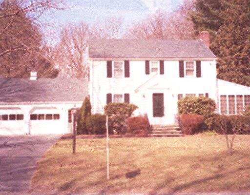 240 Godfrey Road Fairfield, CT 06825 - Photo 1 of 1 a front view of a house with a yard