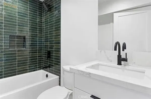 a bathroom with a sink and bathtub