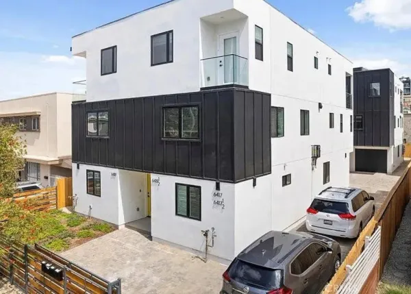 a house view with a backyard space