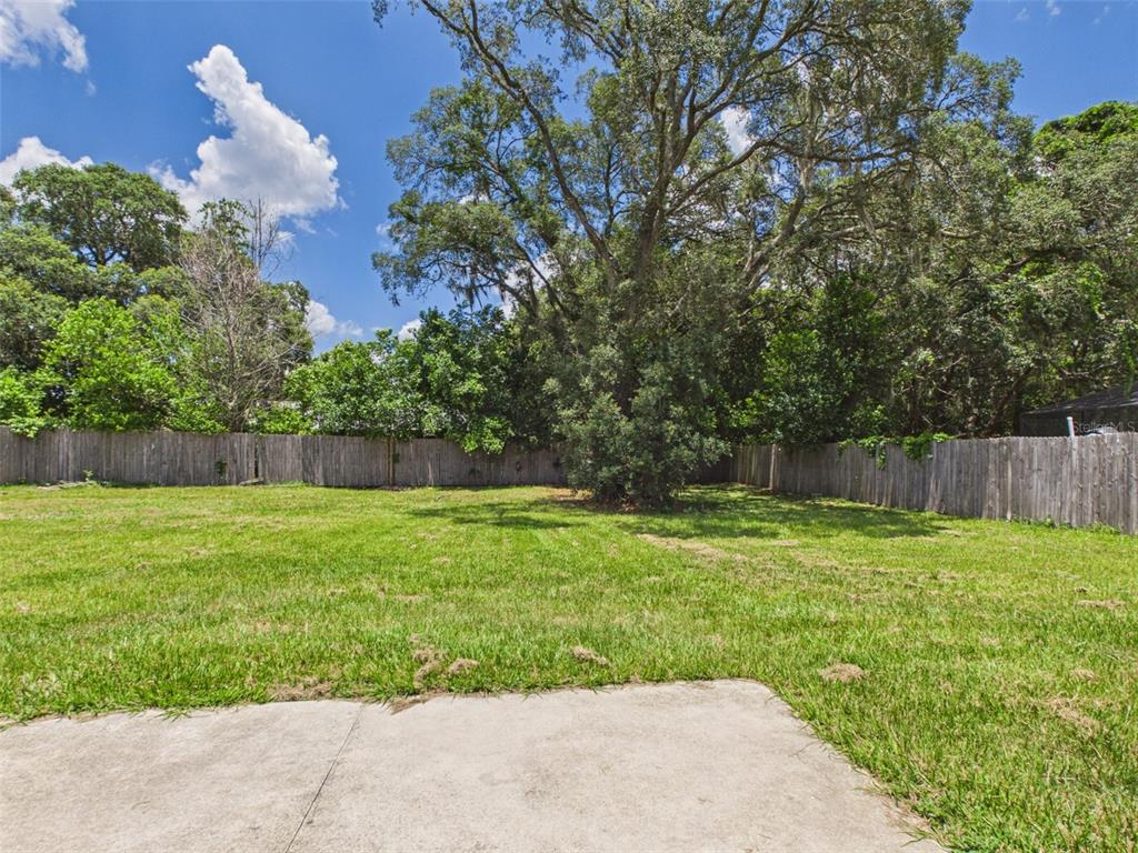 4309 Southwest 143rd Ln Road Ocala, FL 34473 - Photo 20 of 21 a view of a backyard