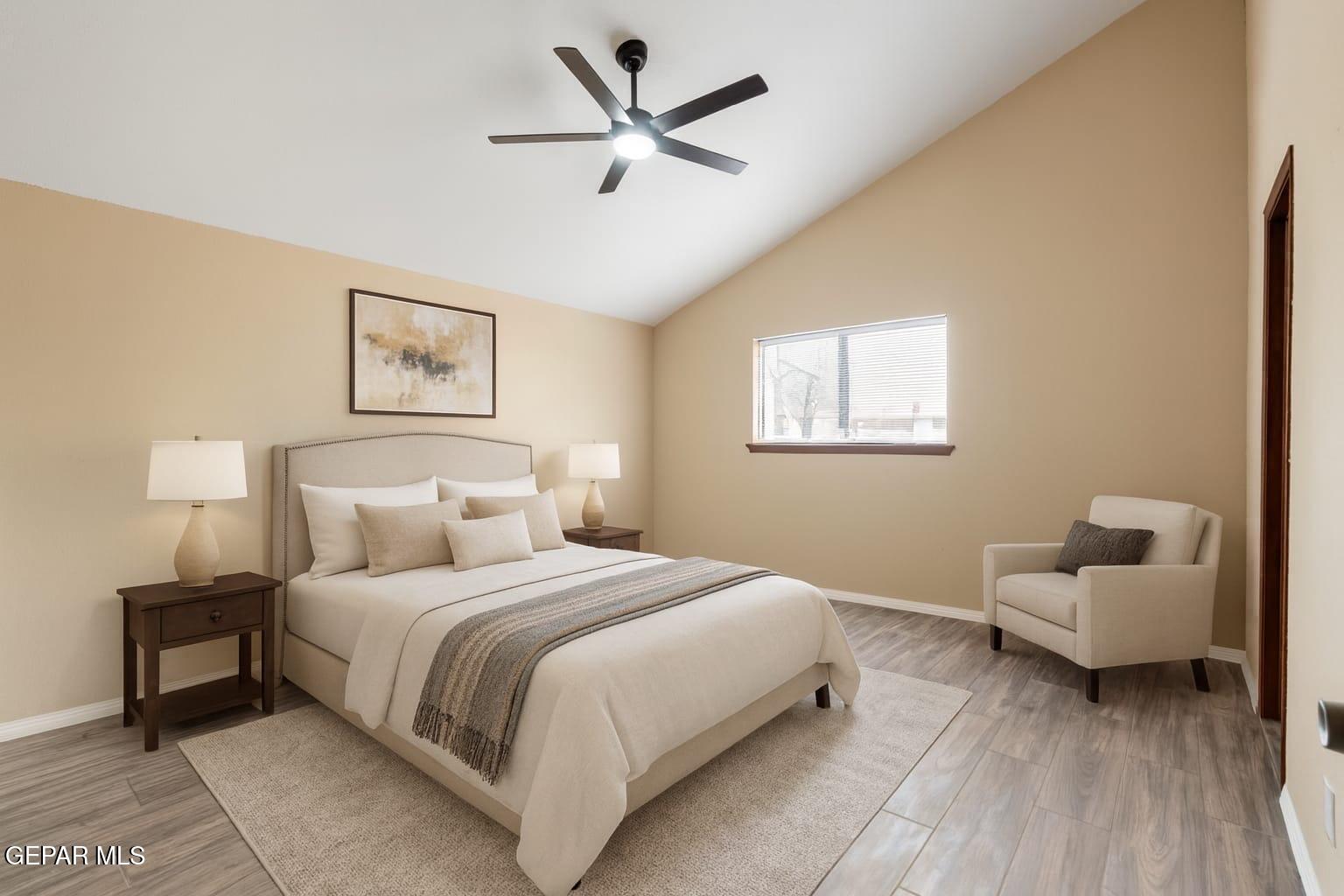 6708 Stone Court El Paso, TX 79924 - Photo 11 of 22 a bedroom with a bed and a couch