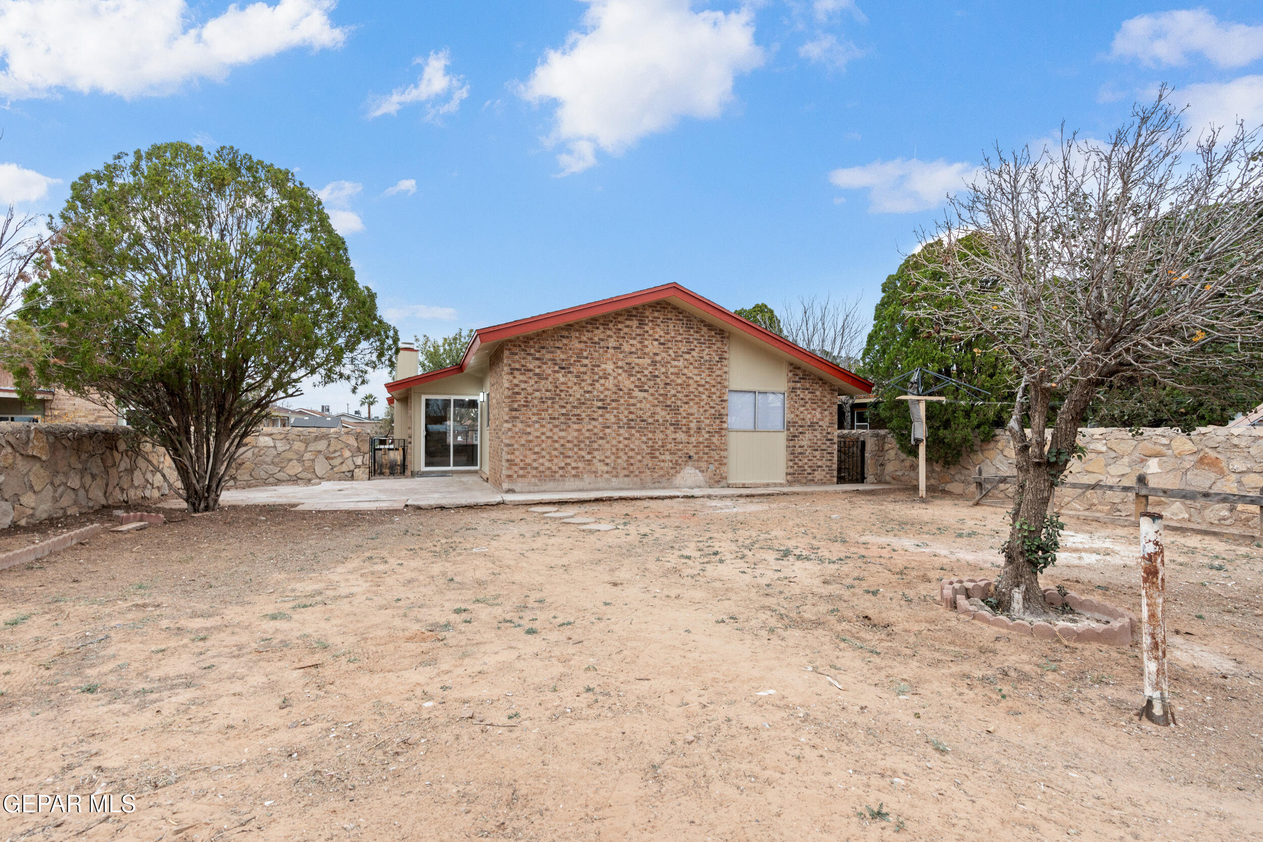 6708 Stone Court El Paso, TX 79924 - Photo 20 of 22 a house with a tree in the background