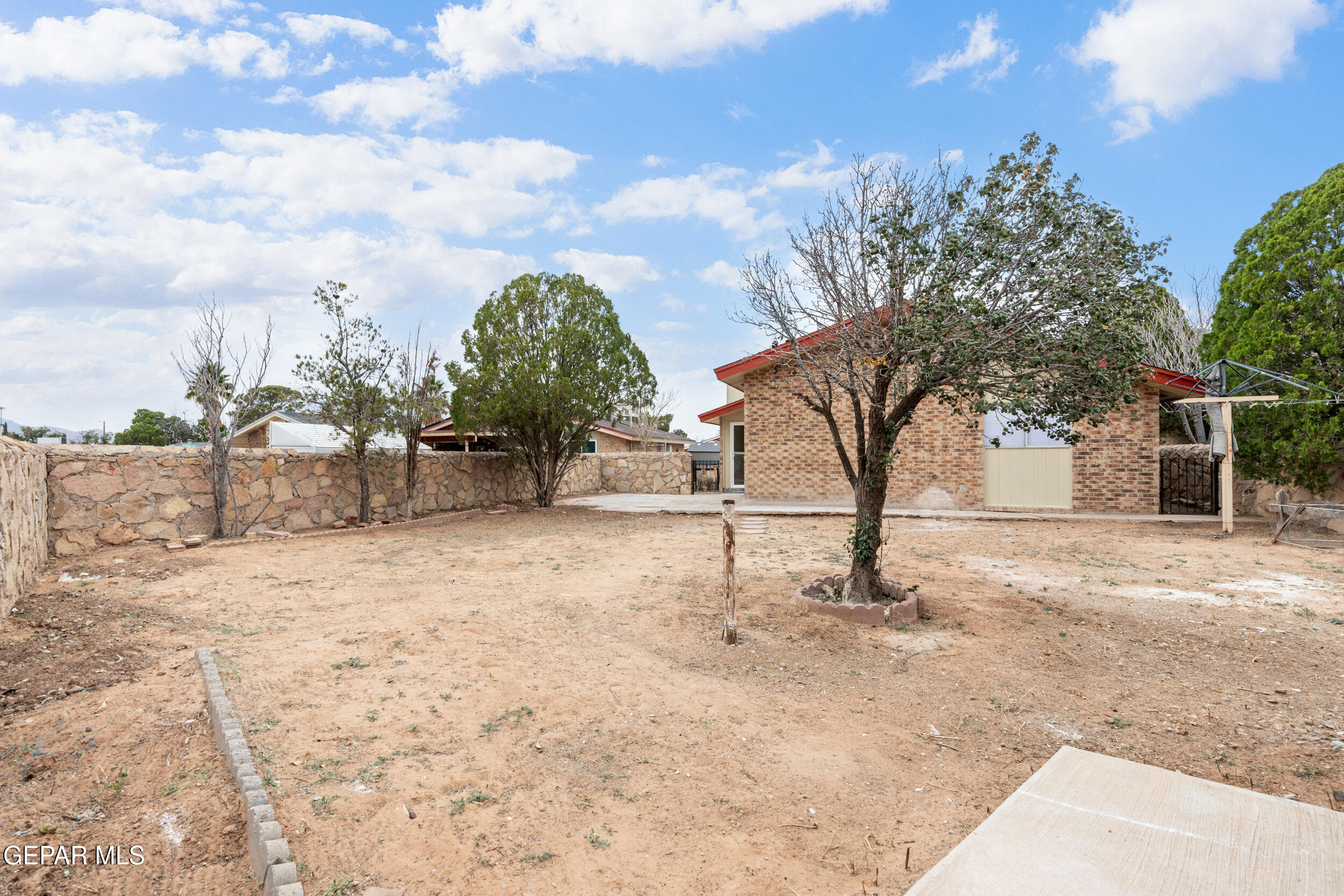 6708 Stone Court El Paso, TX 79924 - Photo 21 of 22 a view of outdoor space with garden