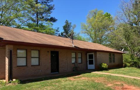 340 Tanglewood Drive, Unit A Monroe, GA 30656 - Photo 1 of 17 a view of a house with a yard