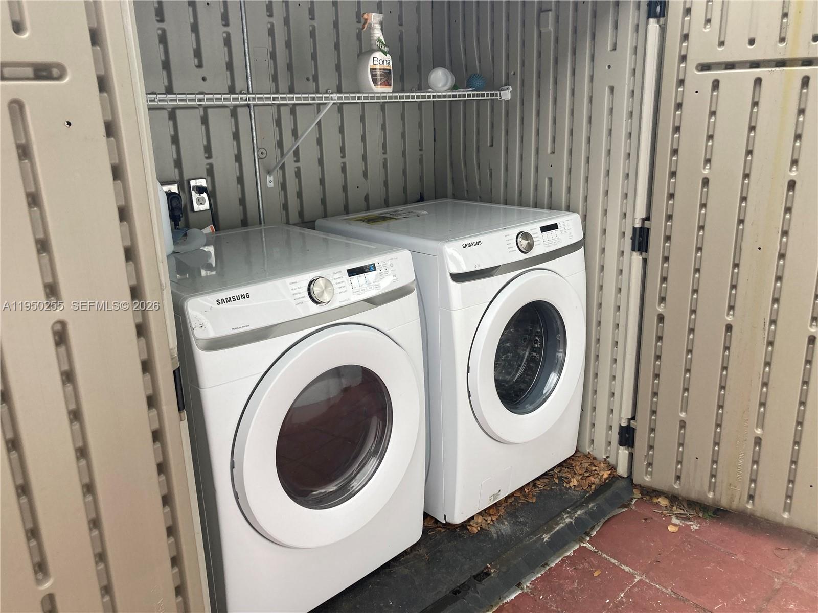 5720 Sheridan Street, Unit 1 Hollywood, FL 33021 - Photo 14 of 14 a utility room with dryer and washer