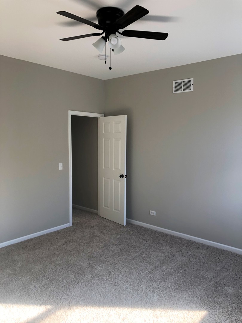 13315 Blakely Drive Plainfield, IL 60585 - Photo 12 of 20 a view of an empty room