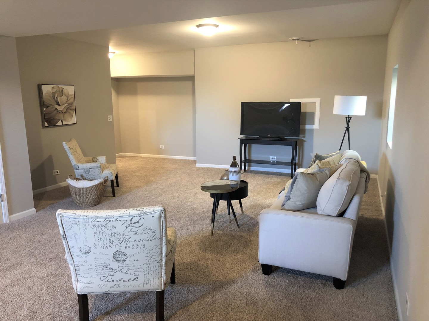 13315 Blakely Drive Plainfield, IL 60585 - Photo 15 of 20 a living room with furniture and a flat screen tv