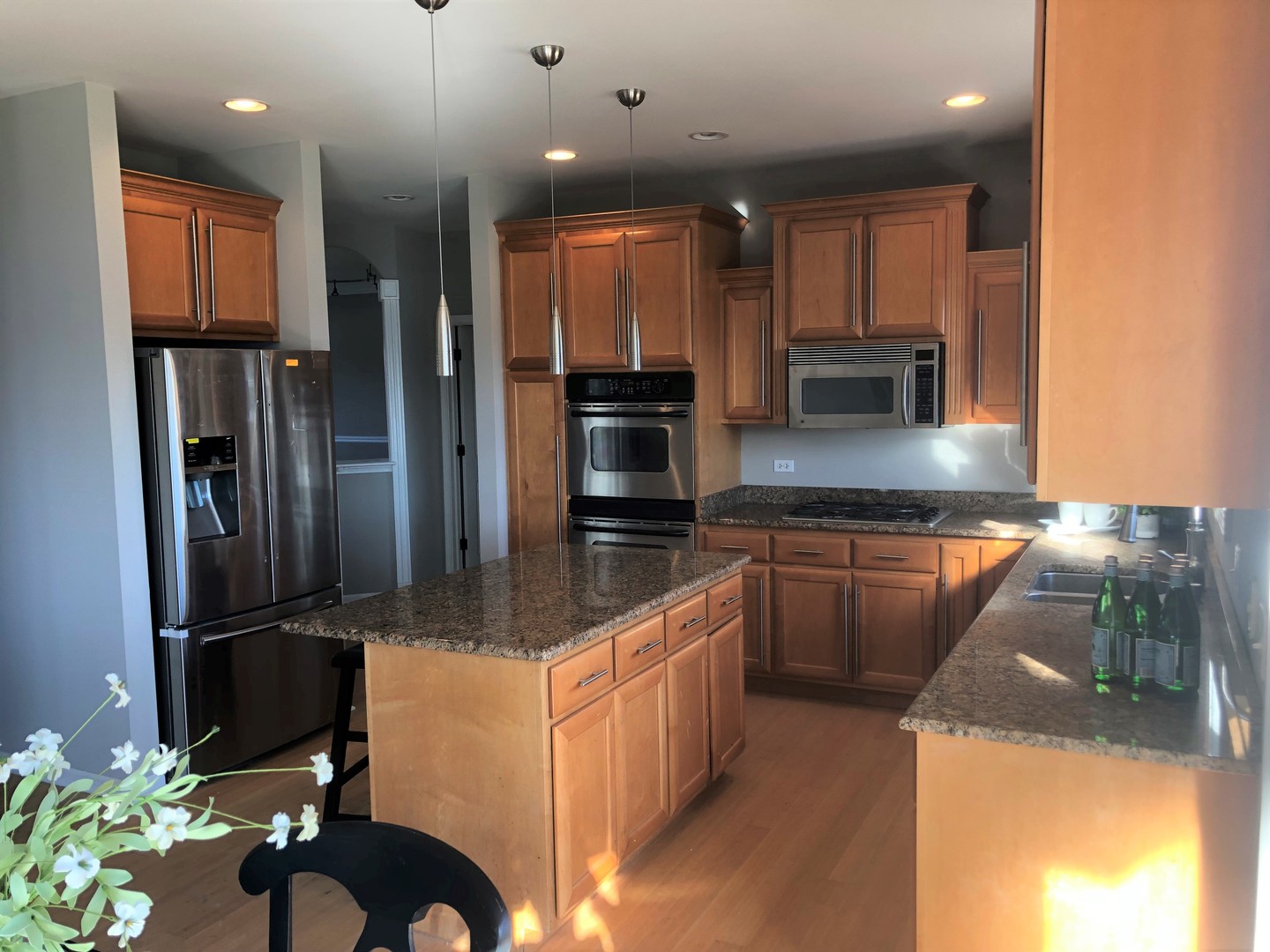 13315 Blakely Drive Plainfield, IL 60585 - Photo 5 of 20 a kitchen with stainless steel appliances granite countertop a refrigerator and a sink