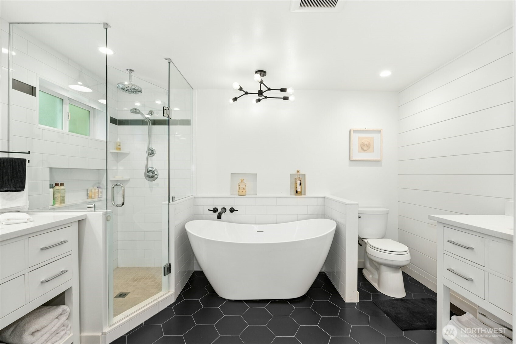 23307 49th Avenue Southeast Bothell, WA 98021 - Photo 15 of 37 a spacious bathroom with a bathtub toilet sink and shower