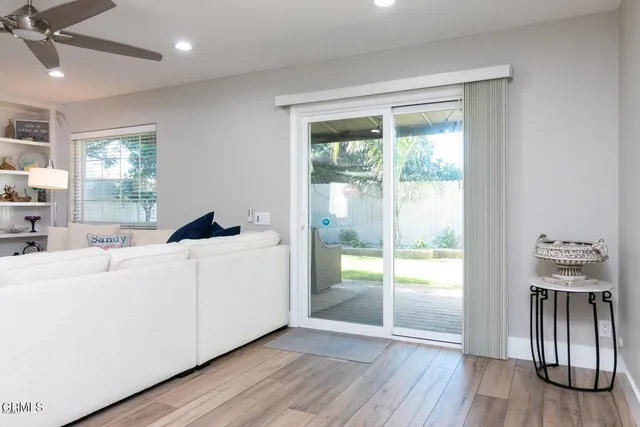 a bathroom with a double vanity sink mirror and shower