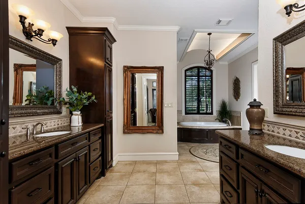 a kitchen with a sink and refrigerator