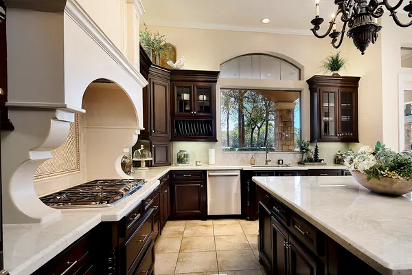 a kitchen with a sink a stove and a microwave
