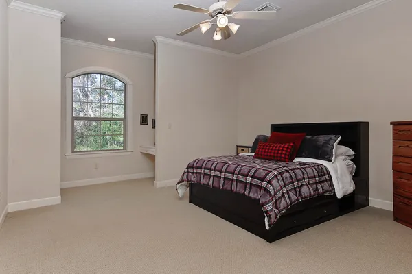 a view of closet area with shoes