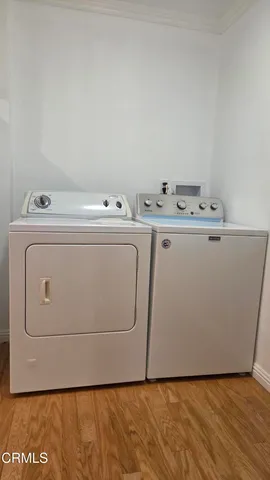 a bathroom with a sink mirror vanity and toilet