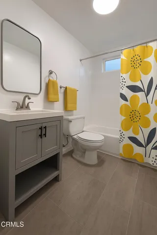 a view of staircase with white fence and wooden fence