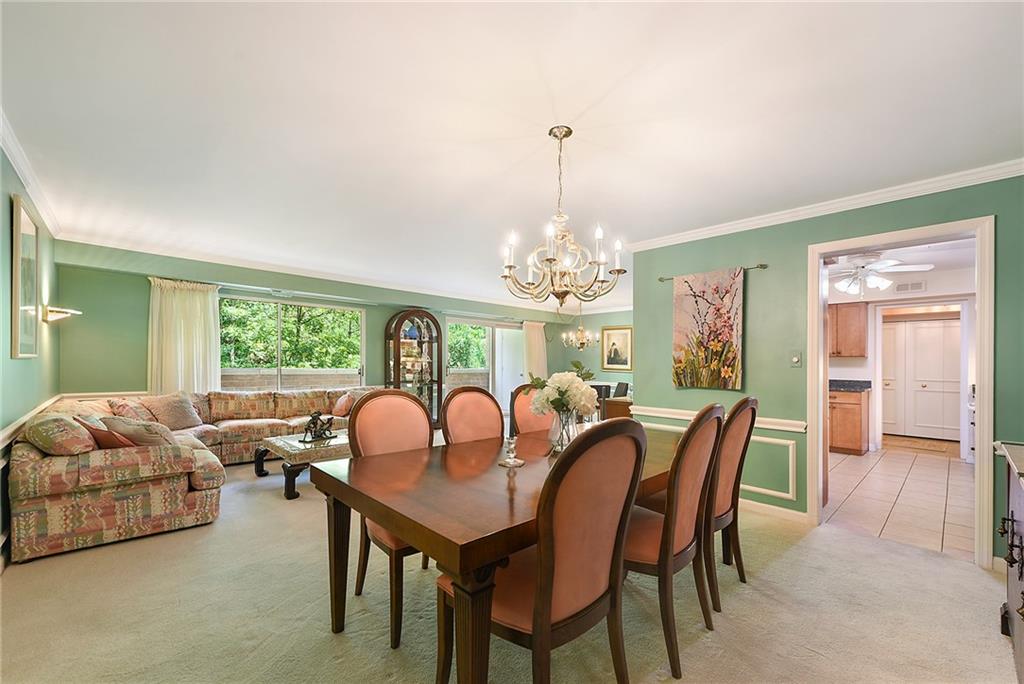 300 Fox Chapel Road, Unit 405 Pittsburgh, PA 15238 - Photo 15 of 30 a view of a dining room with furniture window and outside view