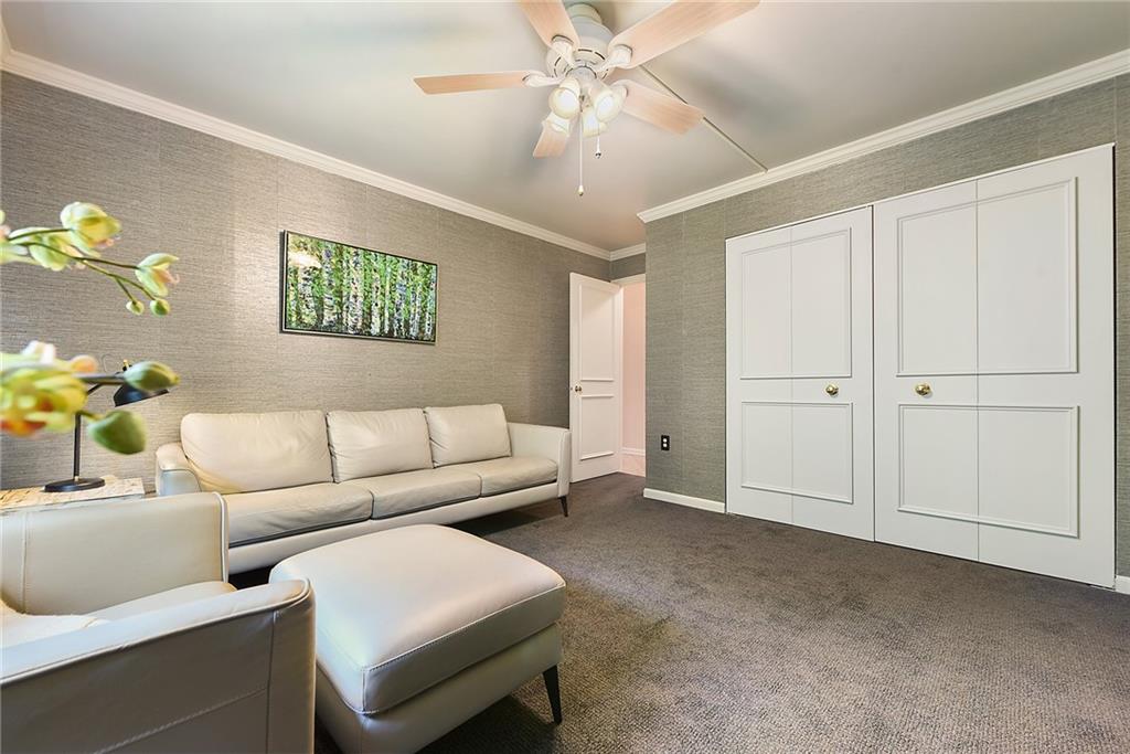 300 Fox Chapel Road, Unit 405 Pittsburgh, PA 15238 - Photo 18 of 30 a living room with furniture and a ceiling fan