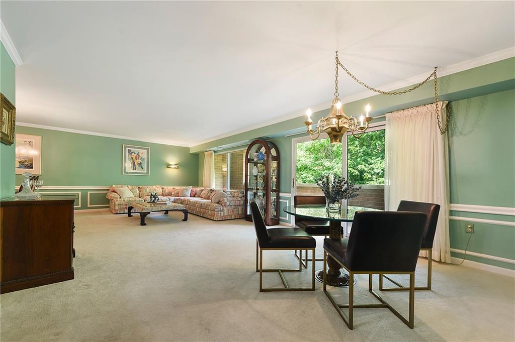 300 Fox Chapel Road, Unit 405 Pittsburgh, PA 15238 - Photo 9 of 30 a view of a livingroom with furniture and a window