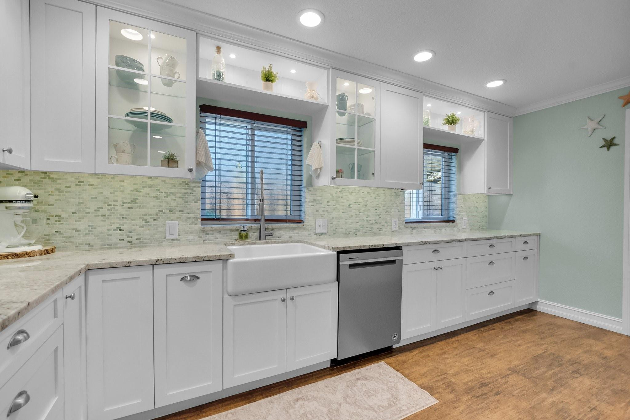 548 Northwest 55th Street Boca Raton, FL 33487 - Photo 15 of 33 a kitchen with sink and window