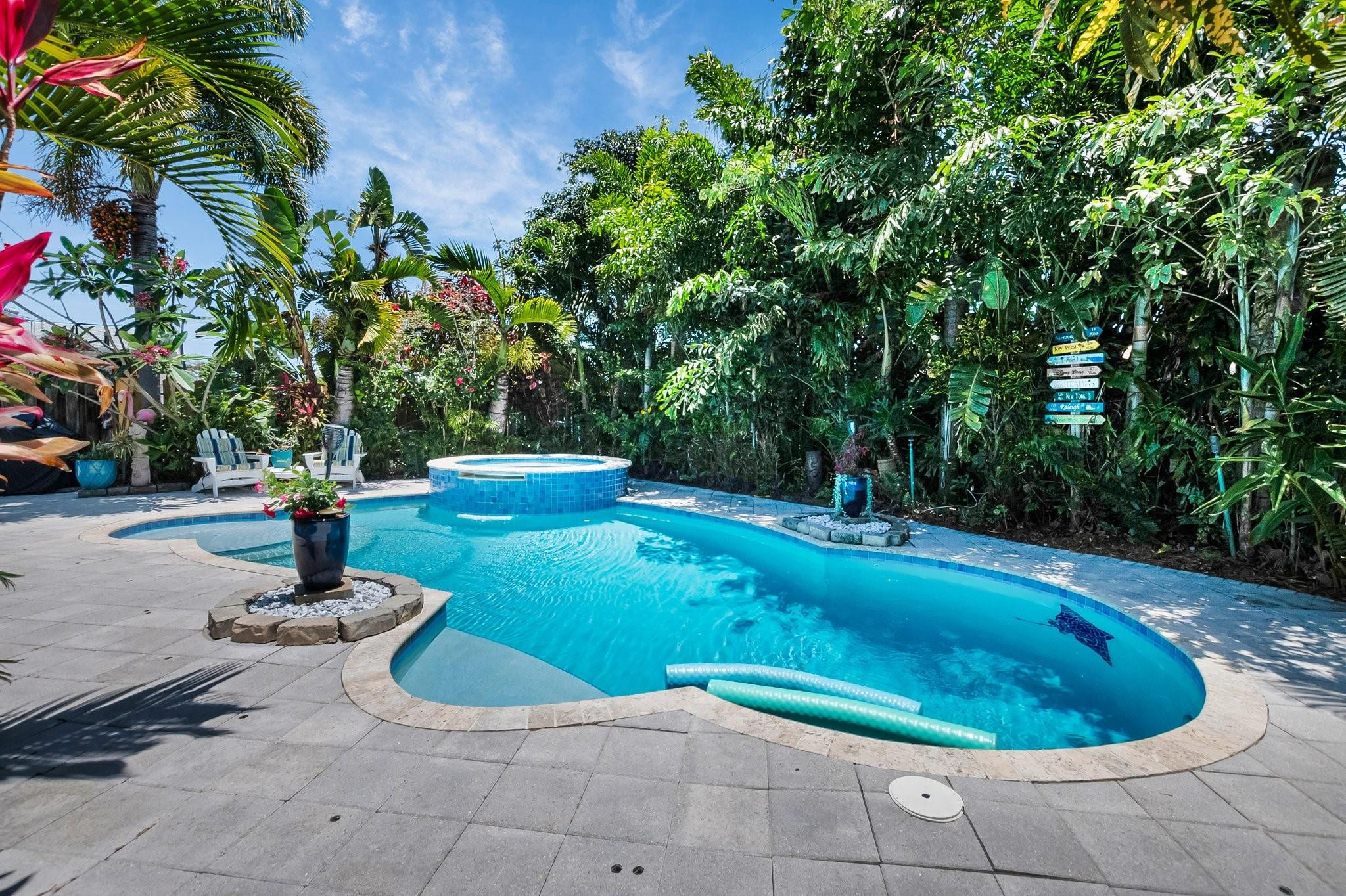 548 Northwest 55th Street Boca Raton, FL 33487 - Photo 32 of 33 a view of a fountain in the patio