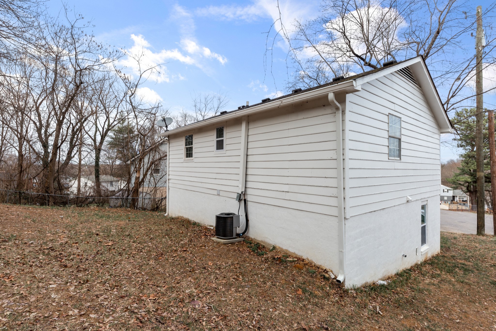 612 Andrea Court Antioch, TN 37013 - Photo 27 of 28 a view of a white house with a large tree