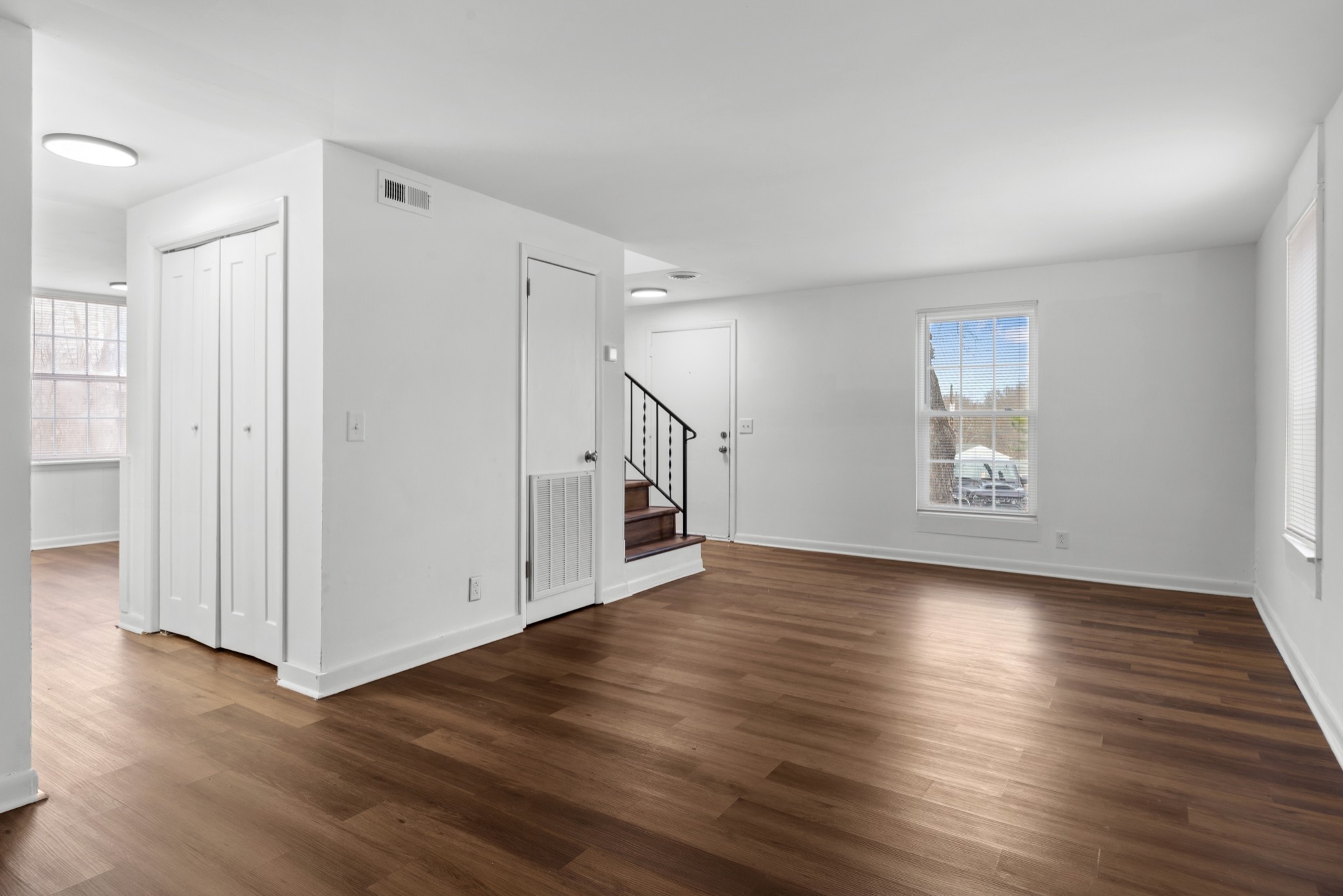 612 Andrea Court Antioch, TN 37013 - Photo 6 of 28 an empty room with wooden floor and windows