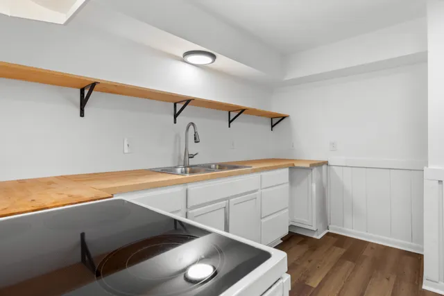 a view of a room with racks on the wall