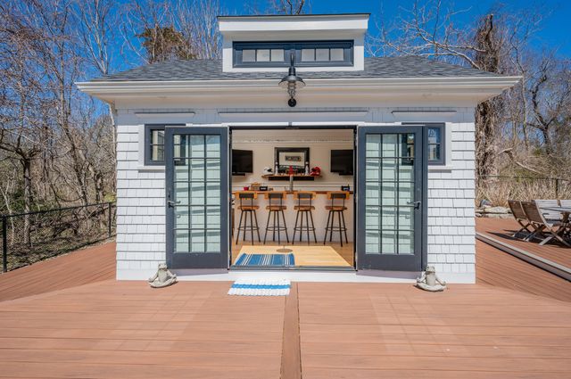 a view of a swimming pool with lounge chair