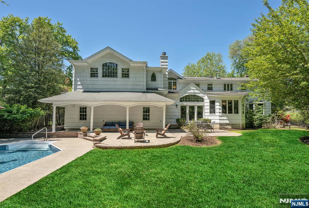 411 Snyder Road Wyckoff, NJ 07481 - Photo 33 of 36 a front view of house with yard and outdoor seating