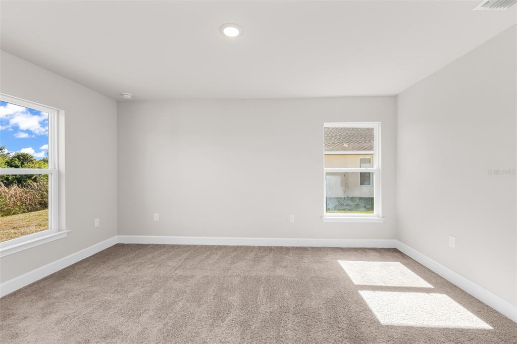 9500 Singer Circle Port Charlotte, FL 33981 - Photo 30 of 60 an empty room with a window
