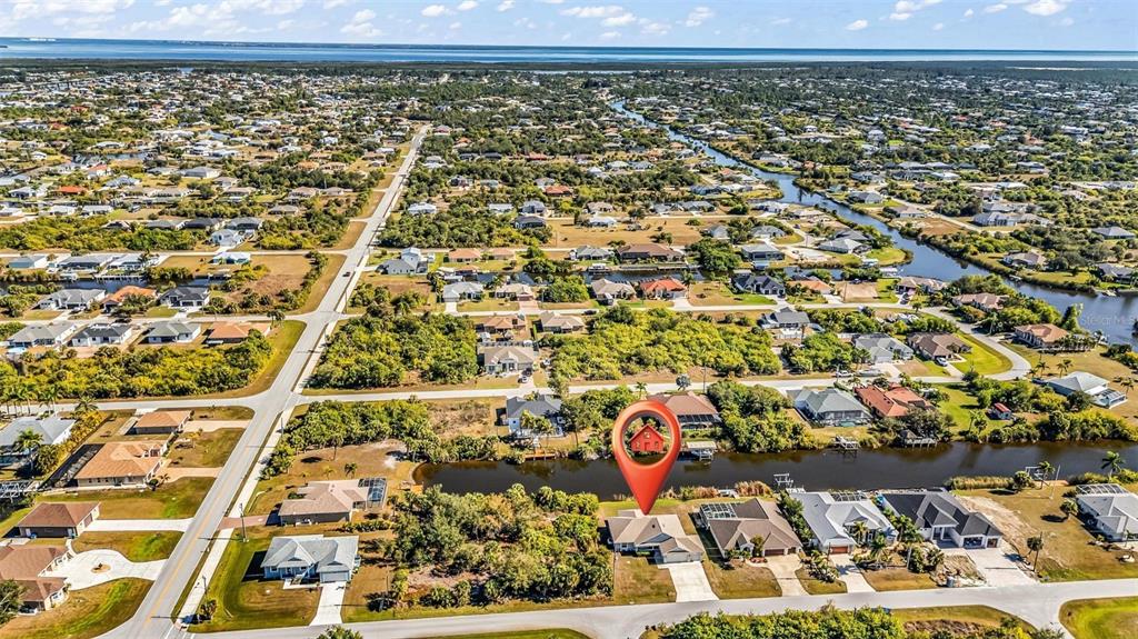 9500 Singer Circle Port Charlotte, FL 33981 - Photo 3 of 60 view of an outdoor space with wooden floor