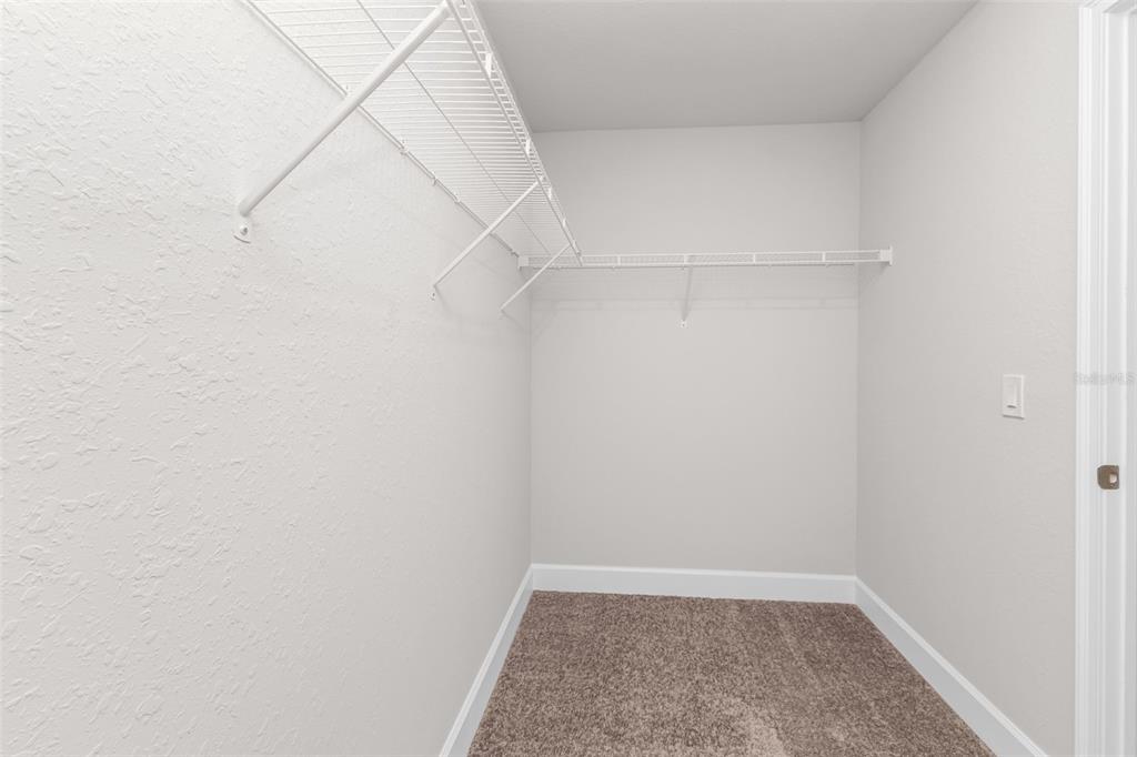 9500 Singer Circle Port Charlotte, FL 33981 - Photo 37 of 60 a view of a room with racks on the wall