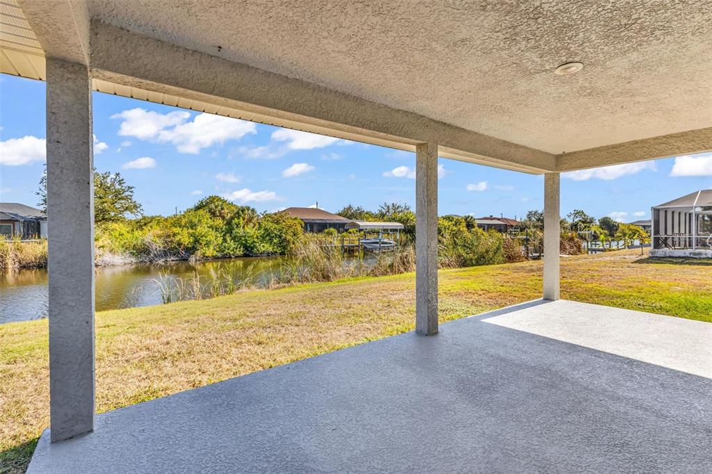 9500 Singer Circle Port Charlotte, FL 33981 - Photo 41 of 60 a view of swimming pool with an outdoor seating