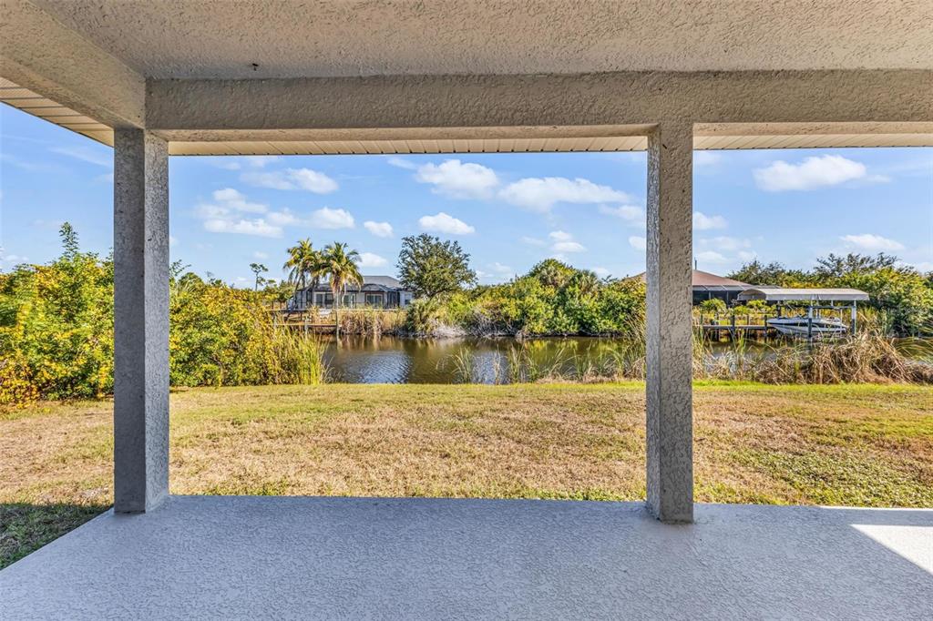 9500 Singer Circle Port Charlotte, FL 33981 - Photo 42 of 60 a view of a ocean from a window