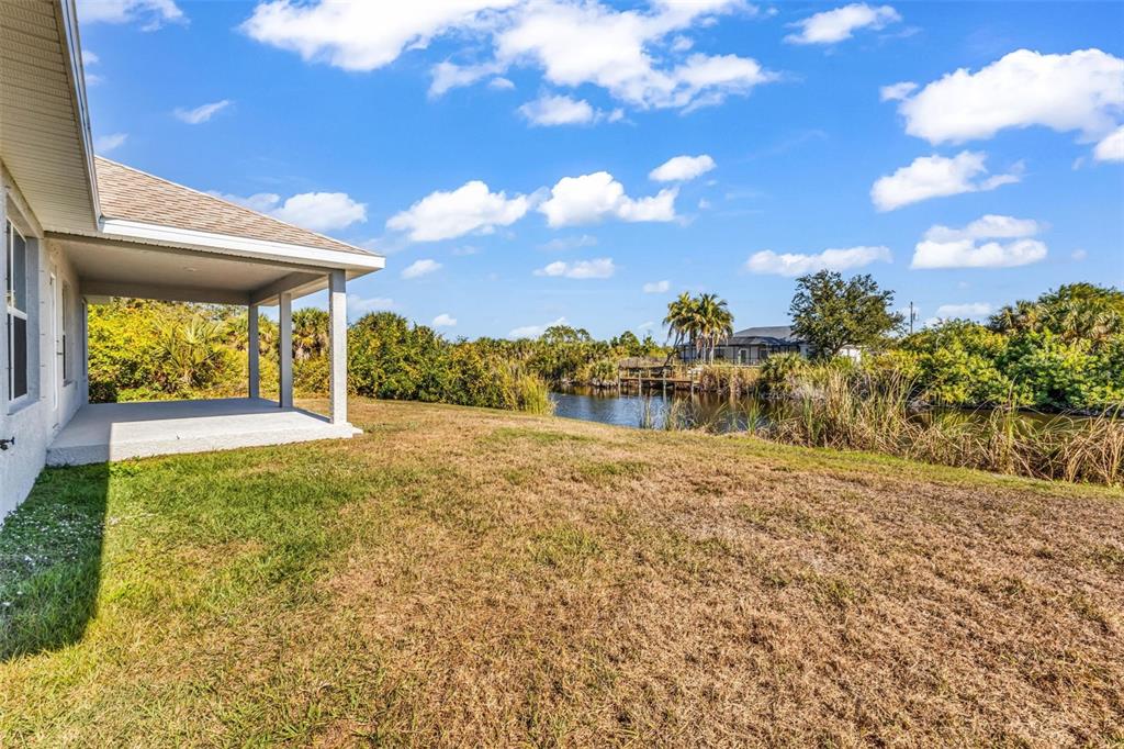 9500 Singer Circle Port Charlotte, FL 33981 - Photo 43 of 60 a view of a back yard