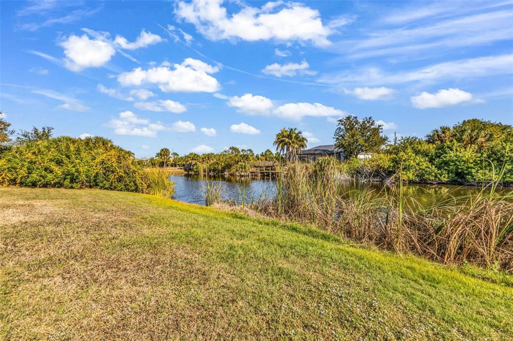 9500 Singer Circle Port Charlotte, FL 33981 - Photo 46 of 60 a view of lake view and mountain