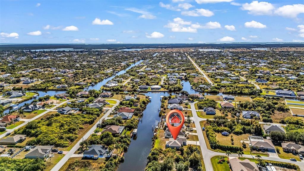 9500 Singer Circle Port Charlotte, FL 33981 - Photo 50 of 60 an aerial view of a city